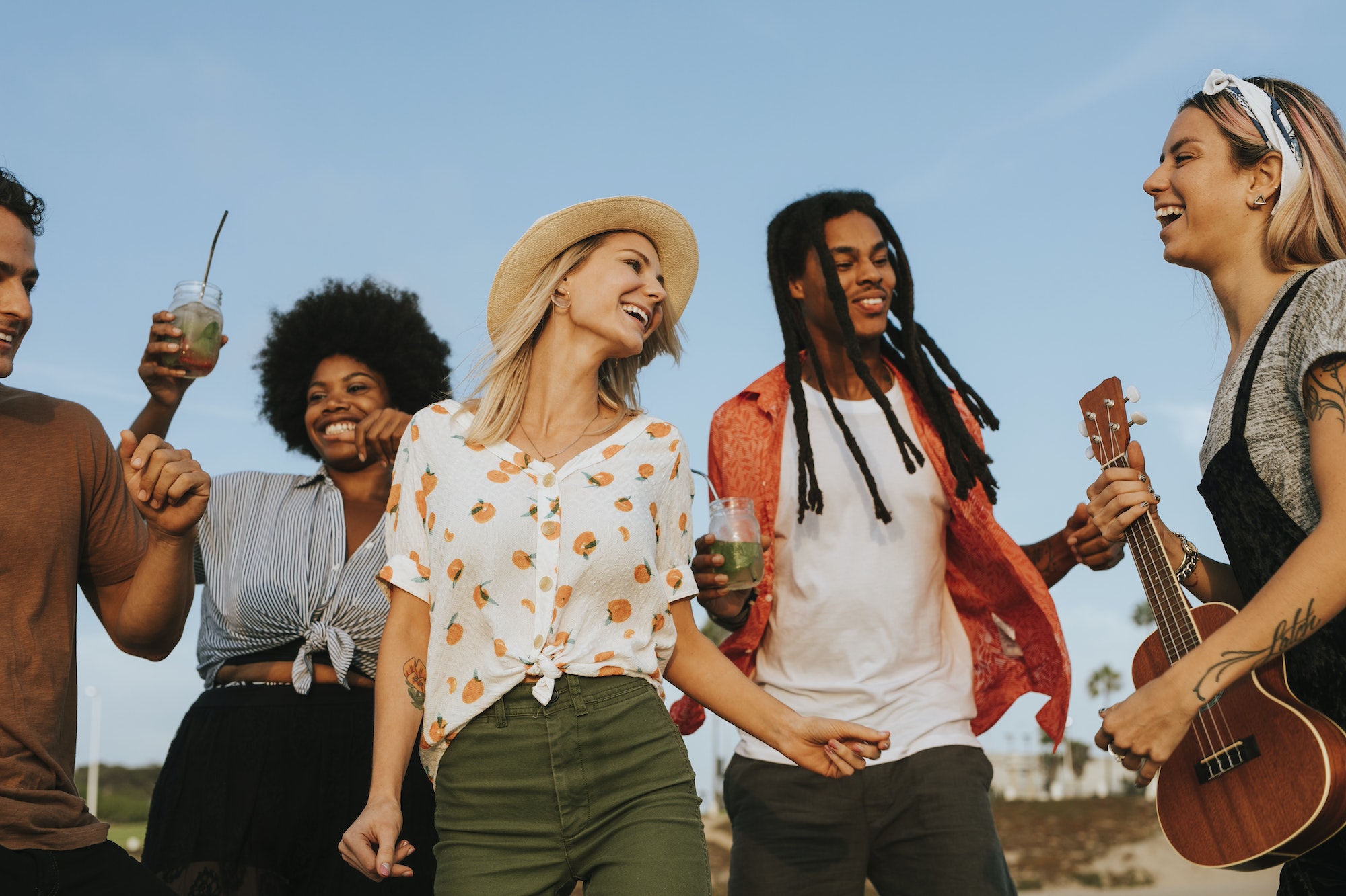friends-singing-and-dancing-at-the-beach.jpg