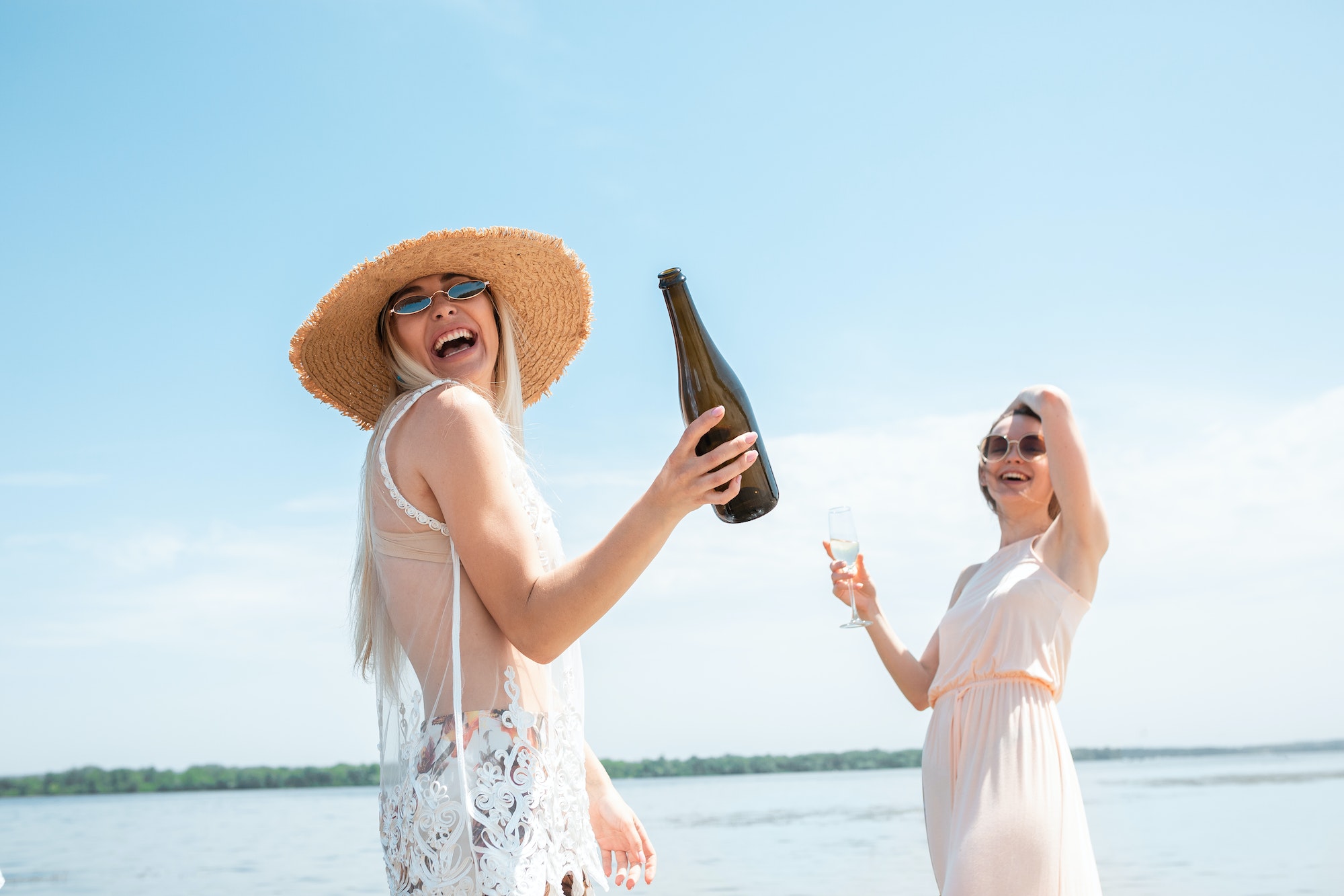 seasonal-feast-at-beach-resort-close-up-woman-celebrating-resting-having-fun-on-the-beach-in.jpg