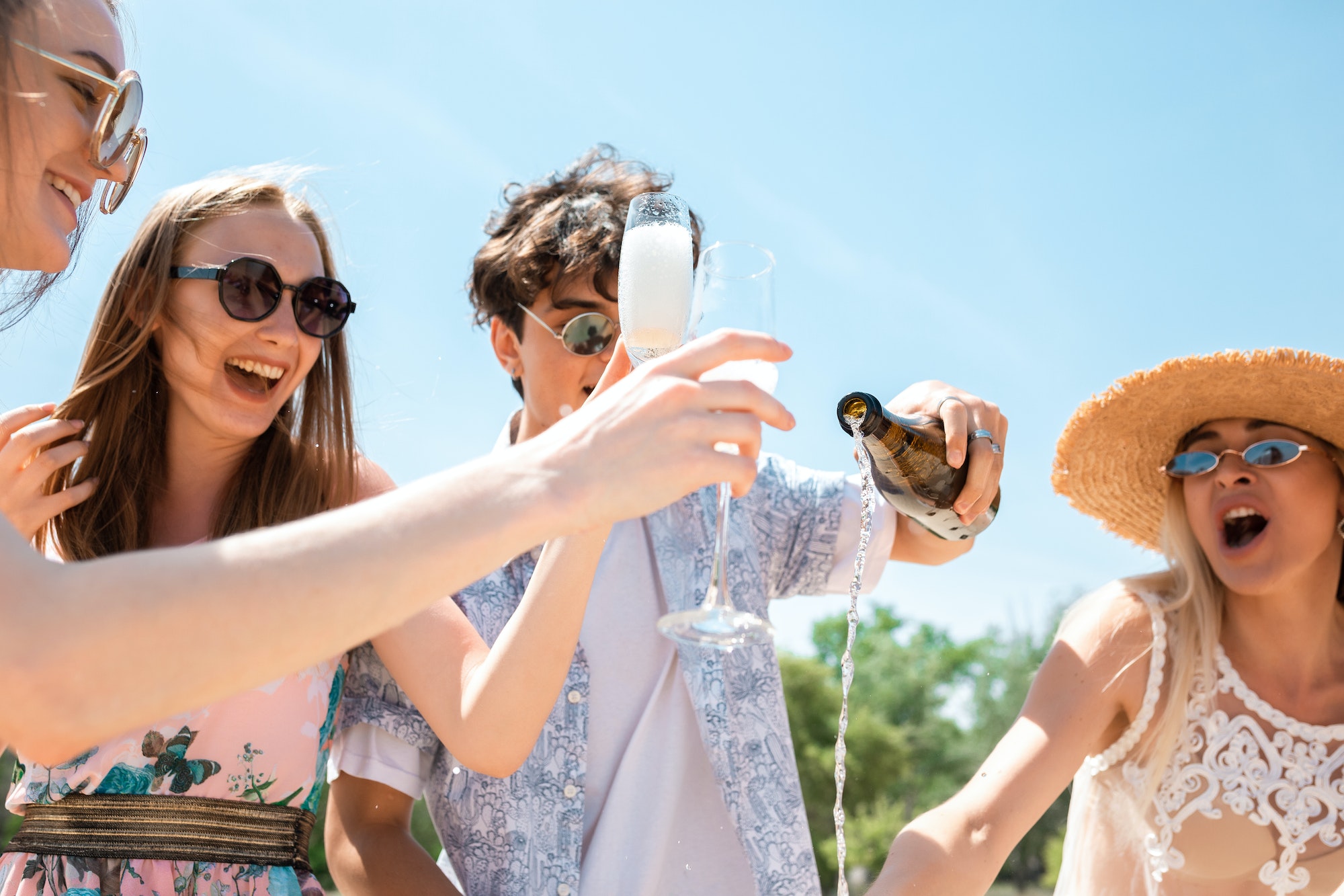 seasonal-feast-at-beach-resort-group-of-friends-celebrating-resting-having-fun-on-the-beach-in-1.jpg